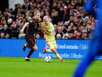 Morten Hjulmand of Denmark and Dani Olmo of Spain battle for the ball during the Nations League Round 5 match between Denmark against Spain...