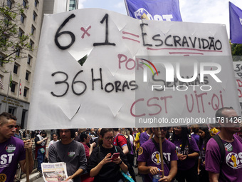 Labor activists demonstrate on Paulista Avenue in Sao Paulo, Brazil, on November 15, 2024 against the work schedule where workers have only...