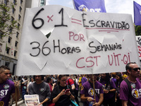 Labor activists demonstrate on Paulista Avenue in Sao Paulo, Brazil, on November 15, 2024 against the work schedule where workers have only...