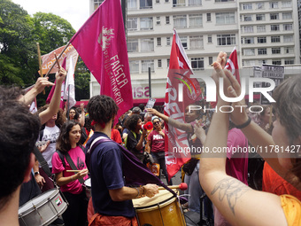 Labor activists demonstrate on Paulista Avenue in Sao Paulo, Brazil, on November 15, 2024 against the work schedule where workers have only...