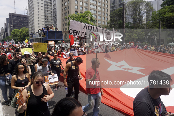 Labor activists demonstrate on Paulista Avenue in Sao Paulo, Brazil, on November 15, 2024 against the work schedule where workers have only...