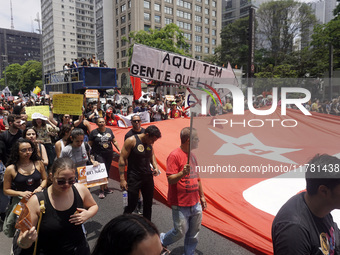 Labor activists demonstrate on Paulista Avenue in Sao Paulo, Brazil, on November 15, 2024 against the work schedule where workers have only...