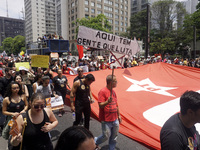 Labor activists demonstrate on Paulista Avenue in Sao Paulo, Brazil, on November 15, 2024 against the work schedule where workers have only...