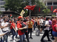 Labor activists demonstrate on Paulista Avenue in Sao Paulo, Brazil, on November 15, 2024 against the work schedule where workers have only...