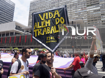 Labor activists demonstrate on Paulista Avenue in Sao Paulo, Brazil, on November 15, 2024 against the work schedule where workers have only...