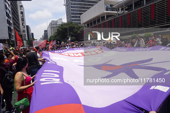 Labor activists demonstrate on Paulista Avenue in Sao Paulo, Brazil, on November 15, 2024 against the work schedule where workers have only...