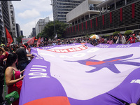 Labor activists demonstrate on Paulista Avenue in Sao Paulo, Brazil, on November 15, 2024 against the work schedule where workers have only...