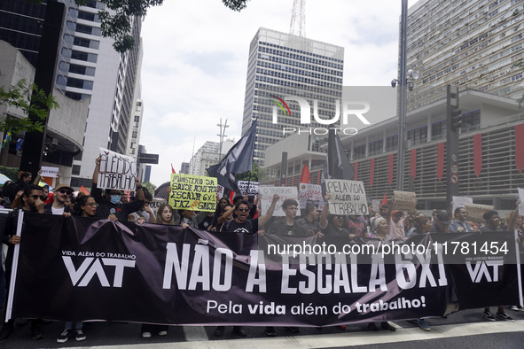 Labor activists demonstrate on Paulista Avenue in Sao Paulo, Brazil, on November 15, 2024 against the work schedule where workers have only...