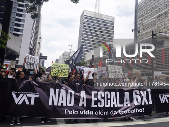 Labor activists demonstrate on Paulista Avenue in Sao Paulo, Brazil, on November 15, 2024 against the work schedule where workers have only...