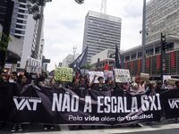 Labor activists demonstrate on Paulista Avenue in Sao Paulo, Brazil, on November 15, 2024 against the work schedule where workers have only...