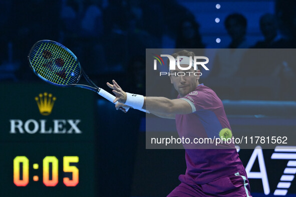 Casper Ruud (NOR) plays during the Men's Singles match against Andrey Rublev (RUS) on day six of the Nitto ATP finals 2024 at Inalpi Arena i...