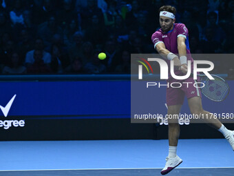 Casper Ruud (NOR) plays during the Men's Singles match against Andrey Rublev (RUS) on day six of the Nitto ATP finals 2024 at Inalpi Arena i...