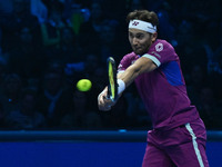 Casper Ruud (NOR) plays during the Men's Singles match against Andrey Rublev (RUS) on day six of the Nitto ATP finals 2024 at Inalpi Arena i...