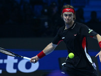 Andrey Rublev (RUS) plays during the Men's Singles match against Casper Ruud (NOR) on day six of the Nitto ATP finals 2024 at Inalpi Arena i...