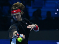 Andrey Rublev (RUS) plays during the Men's Singles match against Casper Ruud (NOR) on day six of the Nitto ATP finals 2024 at Inalpi Arena i...