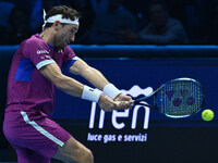 Casper Ruud (NOR) plays during the Men's Singles match against Andrey Rublev (RUS) on day six of the Nitto ATP finals 2024 at Inalpi Arena i...