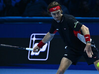 Andrey Rublev (RUS) plays during the Men's Singles match against Casper Ruud (NOR) on day six of the Nitto ATP finals 2024 at Inalpi Arena i...