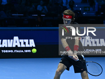 Andrey Rublev (RUS) plays during the Men's Singles match against Casper Ruud (NOR) on day six of the Nitto ATP finals 2024 at Inalpi Arena i...