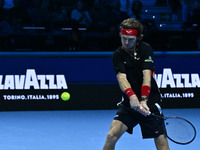 Andrey Rublev (RUS) plays during the Men's Singles match against Casper Ruud (NOR) on day six of the Nitto ATP finals 2024 at Inalpi Arena i...