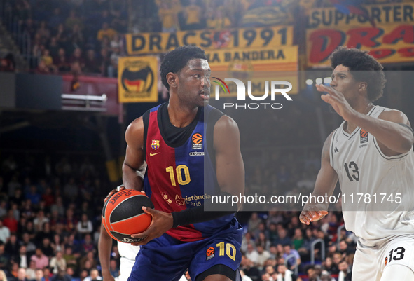 Chimezie Metu and Kevarrius Hayes play during the match between FC Barcelona and Paris Basketball, corresponding to week 10 of the Turkish A...