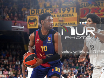 Chimezie Metu and Kevarrius Hayes play during the match between FC Barcelona and Paris Basketball, corresponding to week 10 of the Turkish A...