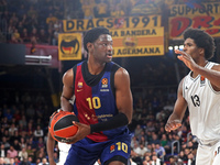 Chimezie Metu and Kevarrius Hayes play during the match between FC Barcelona and Paris Basketball, corresponding to week 10 of the Turkish A...