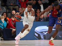 T. J. Shorts and Dame Sarr play during the match between FC Barcelona and Paris Basketball, corresponding to week 10 of the Turkish Airlines...