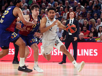 Jabari Parker, Juan Nunez, and Maodo Lo play during the match between FC Barcelona and Paris Basketball, corresponding to week 10 of the Tur...