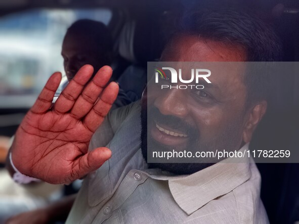 Sri Lankan president Anura Kumara Dissanayake acknowledges his supporters after casting his vote for the parliamentary election in Colombo,...