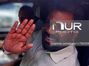 Sri Lankan president Anura Kumara Dissanayake acknowledges his supporters after casting his vote for the parliamentary election in Colombo,...