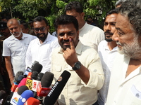 Sri Lankan President Anura Kumara Dissanayake shows his inked finger after casting his vote for the parliamentary election in Colombo, Sri L...