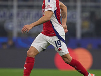 Leandro Trossard of Arsenal runs with the ball during the UEFA Champions League 2024/25 League Phase MD4 match between FC Internazionale Mil...