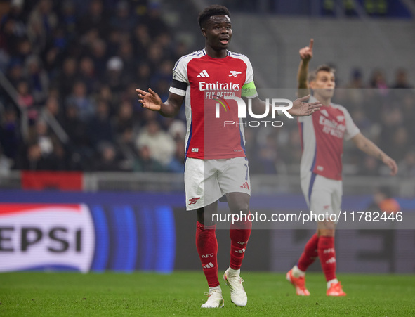 Bukayo Saka of Arsenal reacts during the UEFA Champions League 2024/25 League Phase MD4 match between FC Internazionale Milano and Arsenal F...