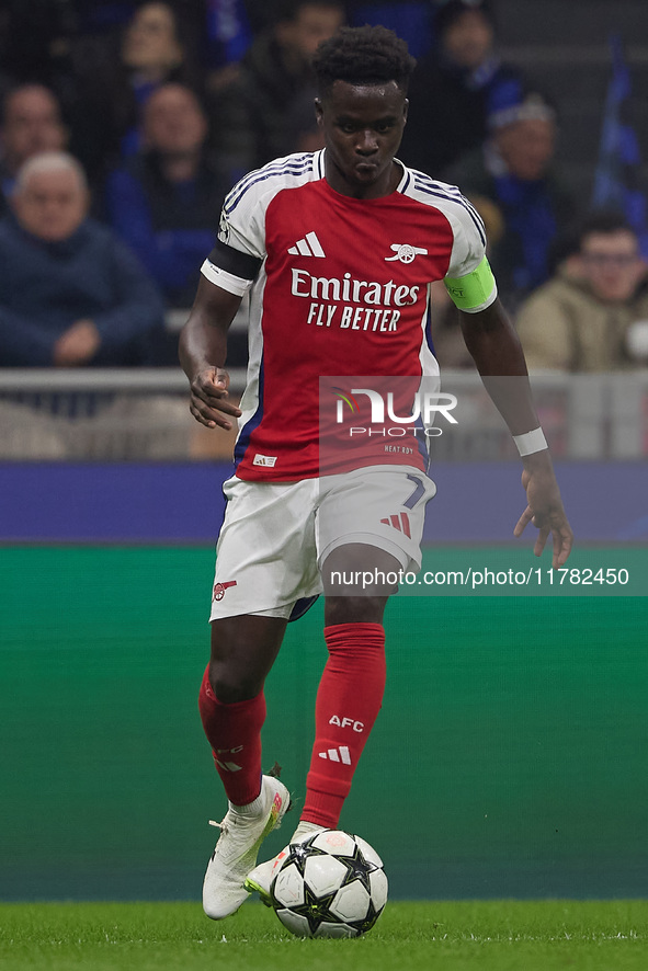 Bukayo Saka of Arsenal is in action during the UEFA Champions League 2024/25 League Phase MD4 match between FC Internazionale Milano and Ars...