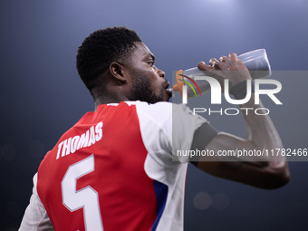 Thomas Partey of Arsenal looks on during the UEFA Champions League 2024/25 League Phase MD4 match between FC Internazionale Milano and Arsen...