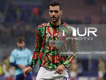 Mikel Merino of Arsenal warms up before the UEFA Champions League 2024/25 League Phase MD4 match between FC Internazionale Milano and Arsena...