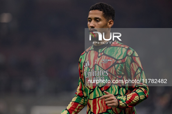 William Saliba of Arsenal warms up before the UEFA Champions League 2024/25 League Phase MD4 match between FC Internazionale Milano and Arse...