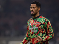 William Saliba of Arsenal warms up before the UEFA Champions League 2024/25 League Phase MD4 match between FC Internazionale Milano and Arse...