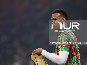 Gabriel of Arsenal warms up before the UEFA Champions League 2024/25 League Phase MD4 match between FC Internazionale Milano and Arsenal FC...