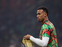 Gabriel of Arsenal warms up before the UEFA Champions League 2024/25 League Phase MD4 match between FC Internazionale Milano and Arsenal FC...