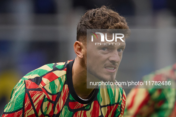 Ben White of Arsenal warms up before the UEFA Champions League 2024/25 League Phase MD4 match between FC Internazionale Milano and Arsenal F...