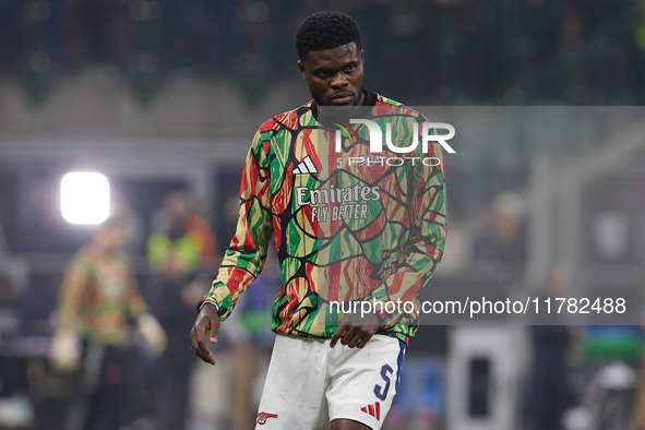 Thomas Partey of Arsenal warms up before the UEFA Champions League 2024/25 League Phase MD4 match between FC Internazionale Milano and Arsen...