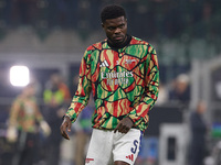 Thomas Partey of Arsenal warms up before the UEFA Champions League 2024/25 League Phase MD4 match between FC Internazionale Milano and Arsen...