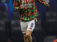 Martin Odegaard of Arsenal warms up before the UEFA Champions League 2024/25 League Phase MD4 match between FC Internazionale Milano and Ars...