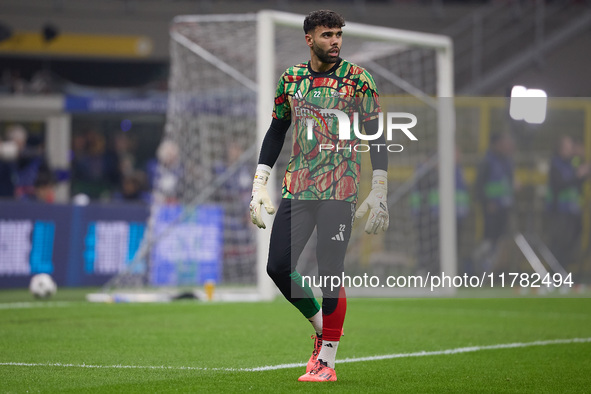 David Raya of Arsenal warms up before the UEFA Champions League 2024/25 League Phase MD4 match between FC Internazionale Milano and Arsenal...