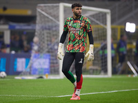 David Raya of Arsenal warms up before the UEFA Champions League 2024/25 League Phase MD4 match between FC Internazionale Milano and Arsenal...