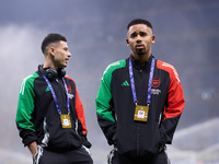 Gabriel Martinelli and Gabriel Jesus of Arsenal look on prior to the UEFA Champions League 2024/25 League Phase MD4 match between FC Interna...