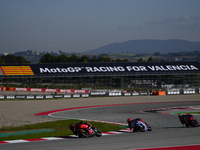 Francesco Pecco Bagnaia (1) of Italy and Ducati Lenovo Team Marc Marquez (93) of Spain and Gresini Racing Moto GP Ducati and Franco Morbidel...