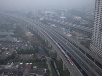 The Jakarta-Bandung high-speed train, also known as Whoosh, is seen crossing Bekasi, West Java, on Saturday, November 16, 2024. Deputy Minis...