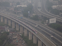 The Jakarta-Bandung high-speed train, also known as Whoosh, is seen crossing Bekasi, West Java, on Saturday, November 16, 2024. Deputy Minis...